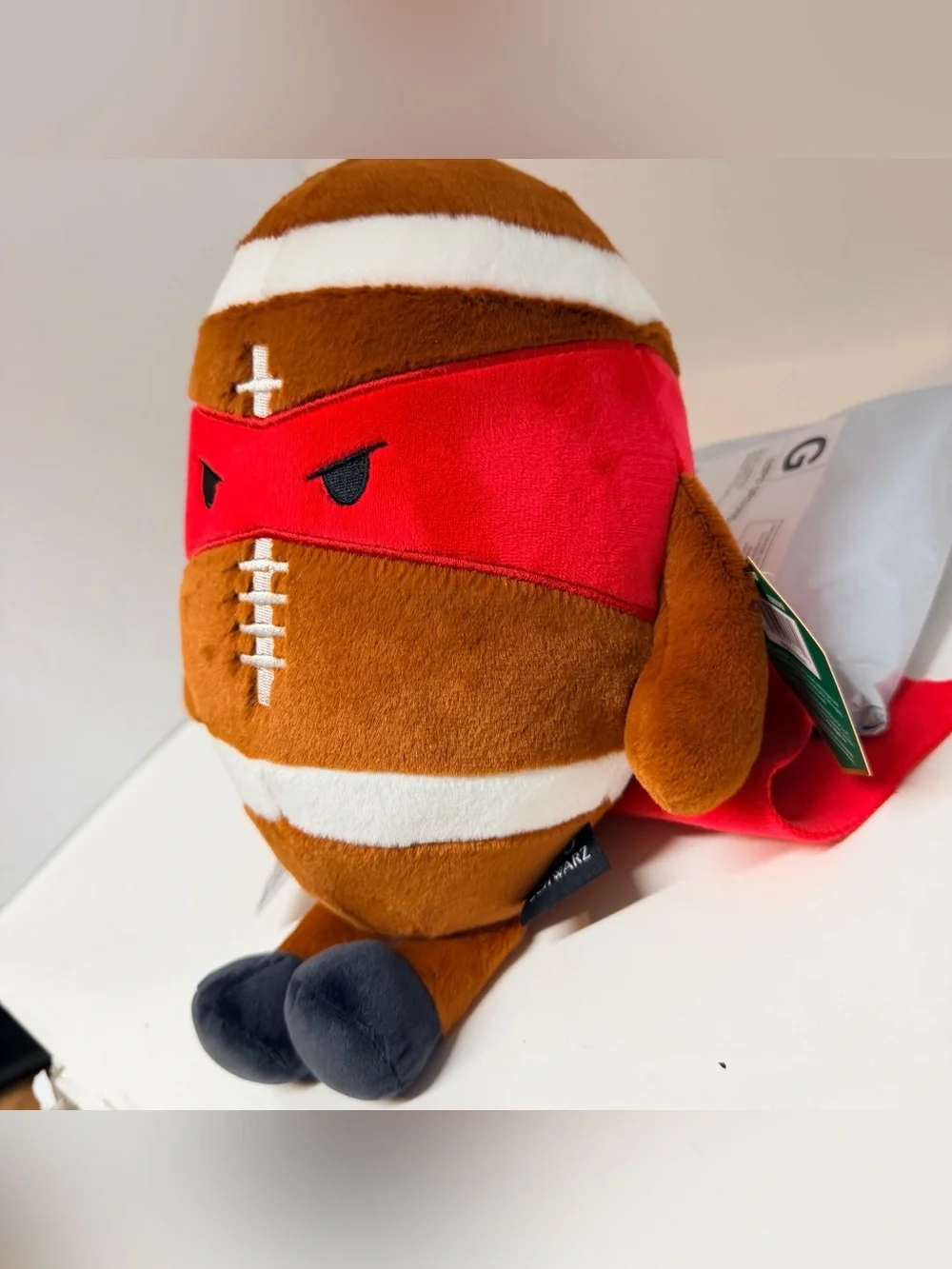 FAO Schwarz Brown Plush Football with Red Mask and Black Feet